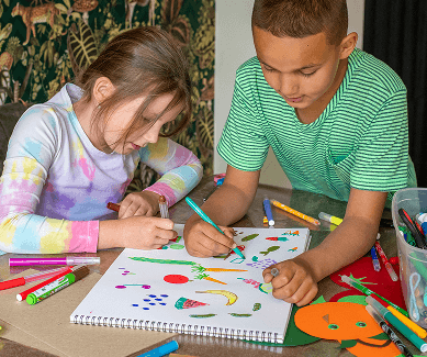 two kids painting